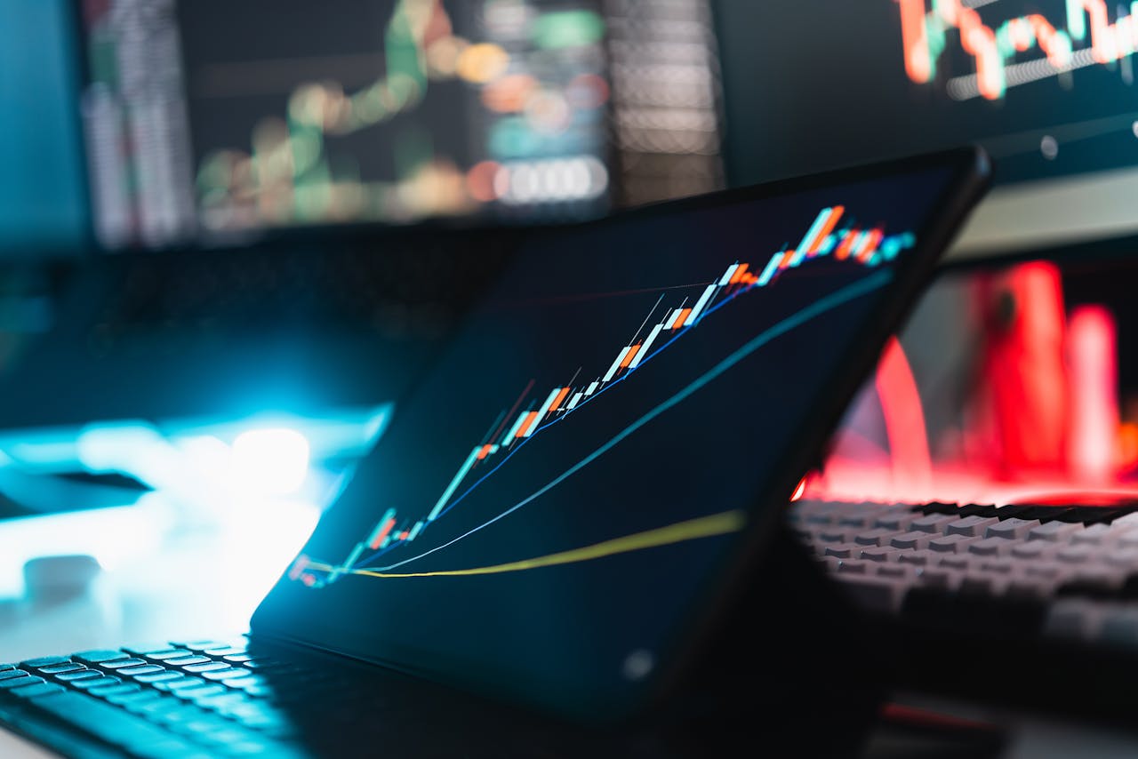 gallery-5 Tablet displaying cryptocurrency growth chart in a digital workspace.